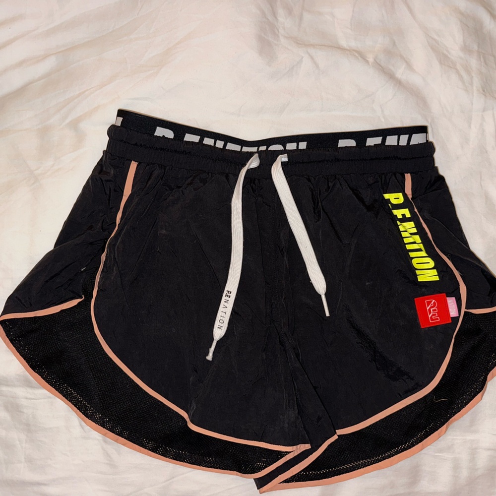 P.E Nation Riochet short in Black and red. Never worn. Size XS